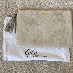 NWOT Gigi Uber Clutch in cream python